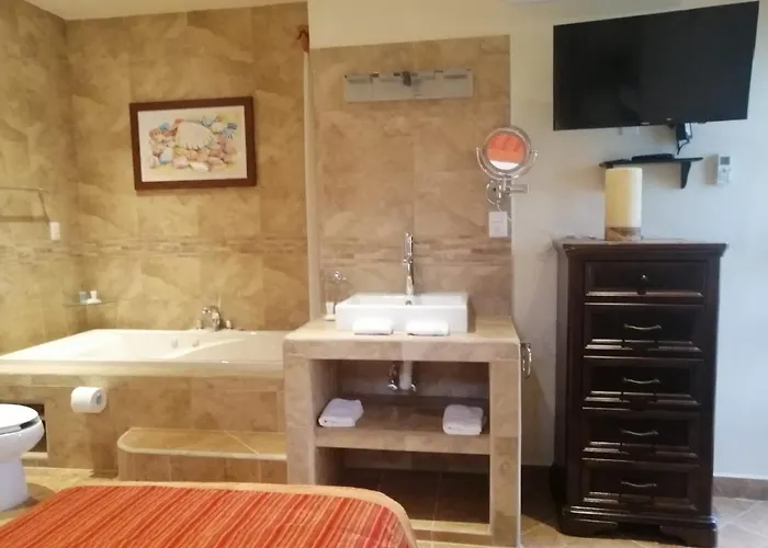 Álamos Inn Hotel con Jacuzzi y Piscina